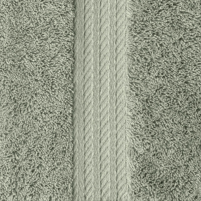 Close-up of the sage green Egyptian cotton bath sheet pile and embroidered border