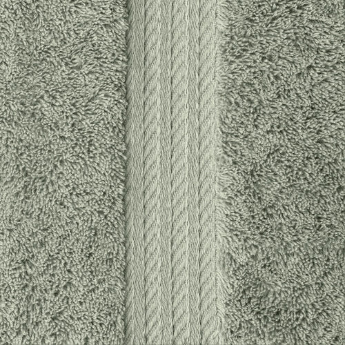 Close-up of the sage green Egyptian cotton bath sheet pile and embroidered border