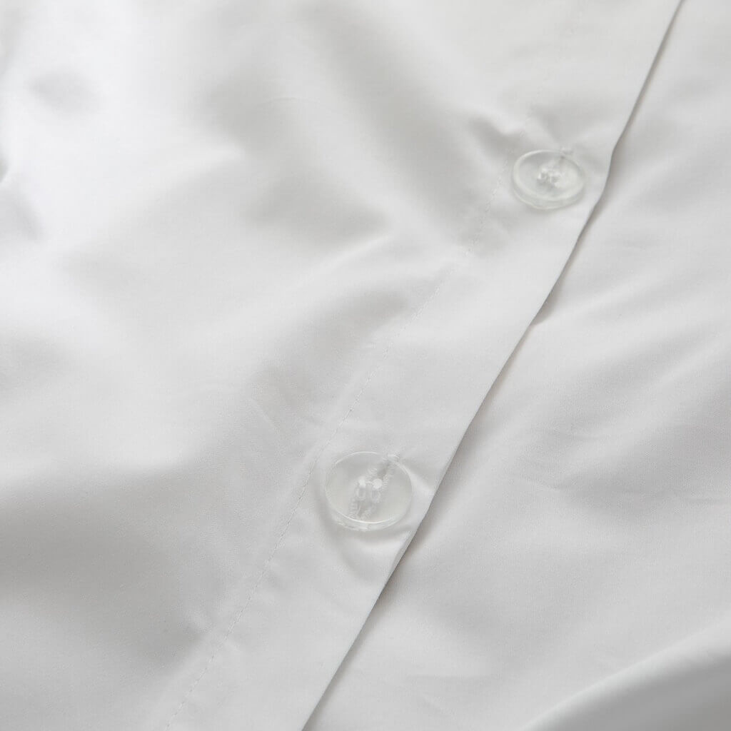 Clear white buttons on duvet covers