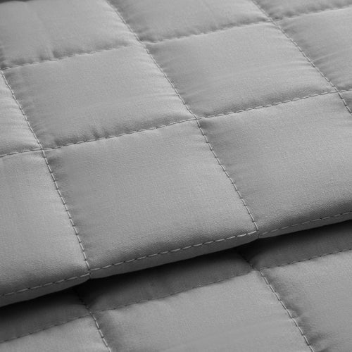Egyptian cotton sateen reversible quilted throw in subtle grey and white