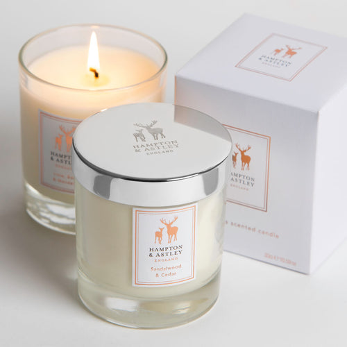 Sandalwood and Cedar Luxury Scented Candle with an included textured white gift box.