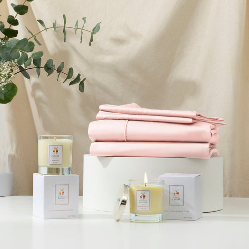 Hampton and Astley’s Blissful Bedtime Bundle includes duvet cover, fitted sheet, two pillowcases and two luxury natural scented candles